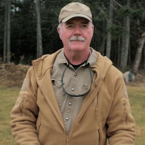 Roly Trainor, Co-owner of P&R Mowing, offering expert lawn care services in Saint John